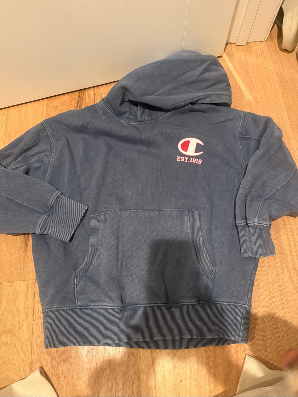 Zara Dusty Blue Hooded Sweatshirt with Small Red & White Chest Emblem